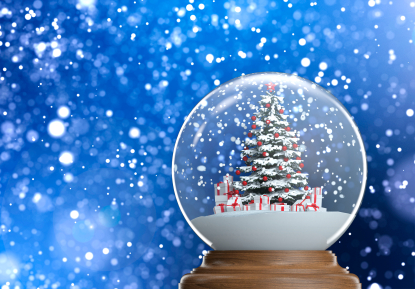 snowglobe with christmas tree and presents inside